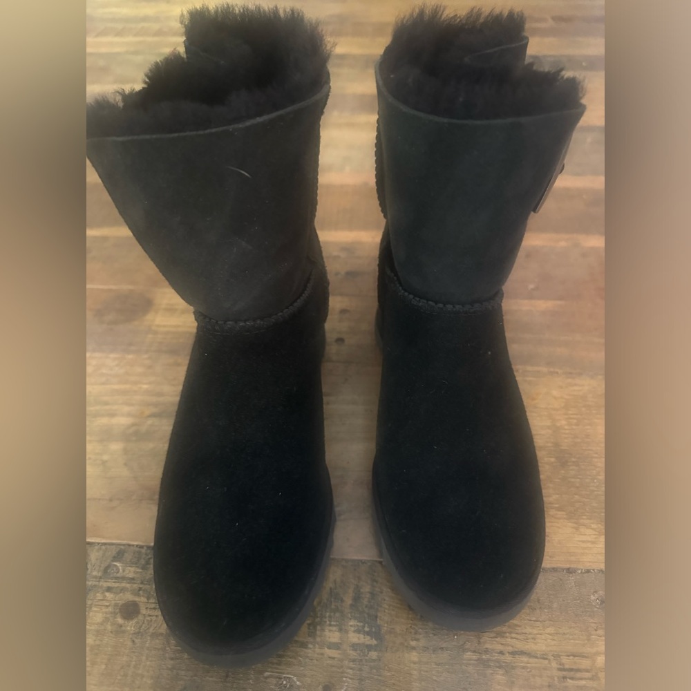 Ugg wedge booties wore twice but too small 
They are a 6 but feel like a 5.5 on